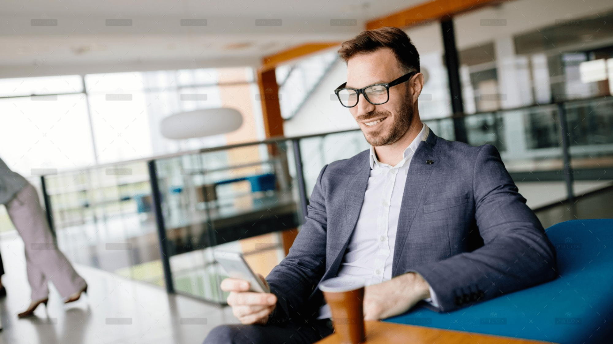 demo-attachment-2831-businessman-taking-a-break-with-a-cup-of-coffee-JW4B3DH